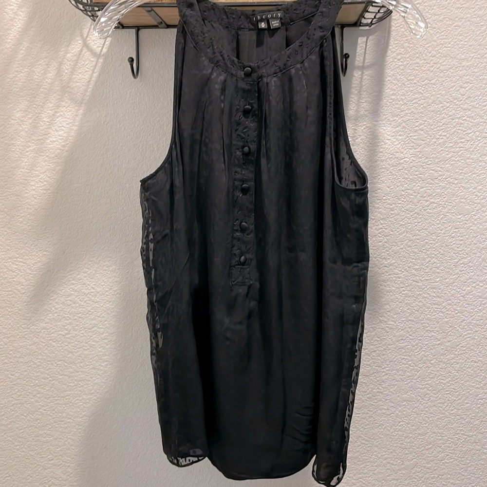 Theory black silk/rayon blouse with burnished fabric and fully lined. Buttons. M